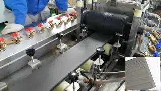 Hegu Co-extrusion online embossing PE WPC profiles line (sophie@wpcmachinery.com)