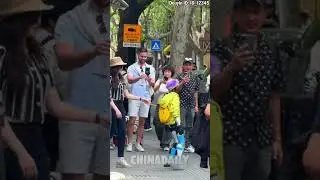 Robots join citywalk in Shanghai