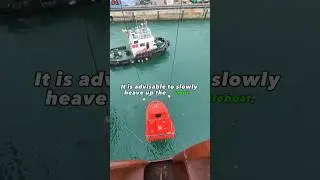 Securing free-fall lifeboat to stowage position #drydock #seaman #seafarer #shipyard #shortsviral