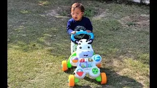 Veda learning to walk on push walker | Down Syndrome Adoption | India
