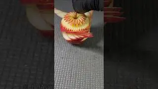 Turning a simple fruit into a masterpiece 🍎✨ | Food art #fruitcarving #shorts