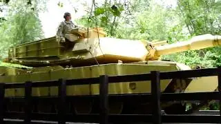 Recycled Plastic Bridge Supports Tank