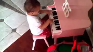 VID 20120815 00055M playing piano