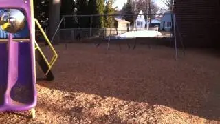 Blowing playground  mulch with one of our express blower trucks