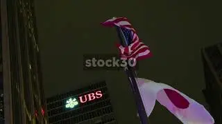 USA And Japan Flags Flying Near UBS Building, New York City, USA