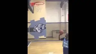 John working on his shooting technique using the 