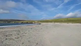 Panorama of the amazing St Ninian's Isle sandy tombolo beach on Shetland Mainland Scotland UK