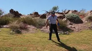 How to Hit a Golf Ball Downslope and Over a Hill