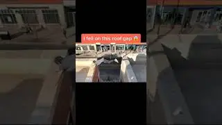 freerunner makes daring jump over a wide distance from roof to roof