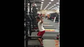 Barbell from Half Squat Behind the Head Press