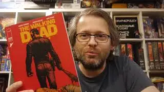 The Walking Dead Deluxe #112 features a solid showdown between Rick and Negan