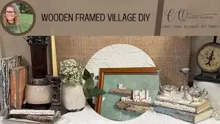Framed wooden village on driftwood  #craftok #repurpose #diyhomedecor