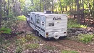 12v cummins pulls 26ft camper off road 1/2 mile up mountain woods