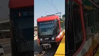 Calgary Transit Siemens Series 9 S200 ad Blue Line to 69th Street Station arriving Bridgeland Statio