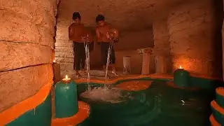 Two men build a swimming pool underground
