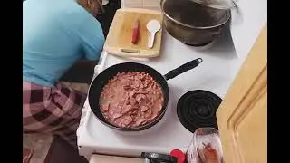 Canned Pinto beans with sausage for a frugal Friday night win.