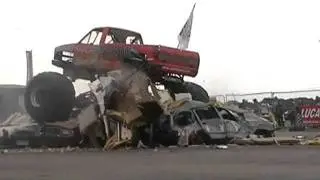Podzilla Monster Truck Crushes a caravan and then gets stuck on top of it at Santa Pod Raceway!