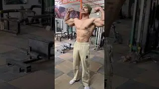 Front double biceps pose with full muscle pump