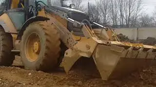 Работа Caterpillar 444E