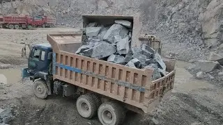 Rock Loading & Transportation Show: Caterpillar 966D & Dump Trucks in Action