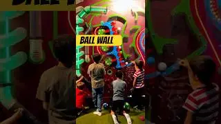 Explore motion, airflow, and fun as balls zoom through our ball wall #stem #montessori #playground