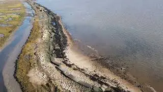 East Mersea, Essex coast sea wall erosion, Seas reclaiming the land on big spring tides. Oct 2024