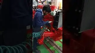 Stage wise assembly in tractor line. Tractor manufacturing plant..