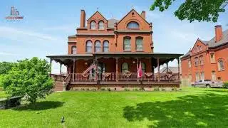 Circa 1889 Richardsonian Romanesque Mansion at 2101 Faraon St