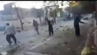 Iranian protesters throw rocks at security forces who shoot at them in Marivan