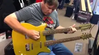 Trying out my first Danelectro double neck guitar.