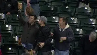 Fan's beer-cup catch and chug