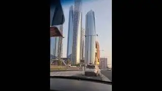 Shining Giants: Etihad Towers Dazzle in Daylight &ndash; Abu Dhabi Views