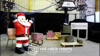 red cable robots - RCR1200 cable robot helps santa load his sleigh - palletizing Demo 2,5m/s speed