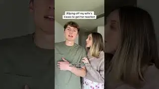 Wiping off my wife's kisses to get her reaction