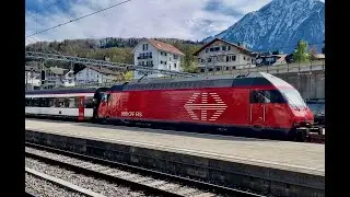 SBB CFF FFS train to Italy's Domodossola via the Simplontunnel under the Alps departs Spiez station