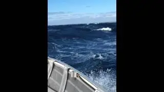 Rough ocean small boat