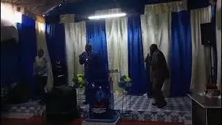 BISHOP MICHAEL GACHAGUA DANCING FOR THE LORD METHODICALLY AND RYTHMATICALLY