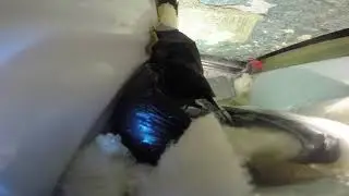 Packing more diapers in a trash compactor.