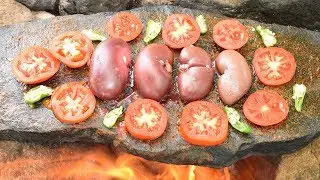 Survival Techniques Ancient Style Cooking Pig Kidney On Stone