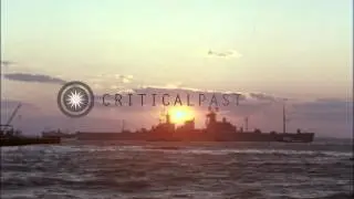 USS Thomas A Edison, USS Northampton tied up at a dock and USS Northampton leaves...HD Stock Footage