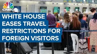 White House eases travel restrictions for foreign visitors