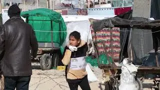 Displaced Gazans Bake Bread Amid Sea of Tents Along Egypt Border