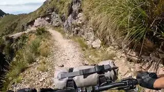 Cliff edge riding on old ghost road. A few nervous giggles to be had.