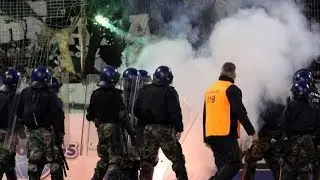 Anorthosis - Omonia Nicosia Clash during the derby, riot police on the pithc and pyro