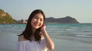Young Asian woman Walking on a Beach  Free 4K Video