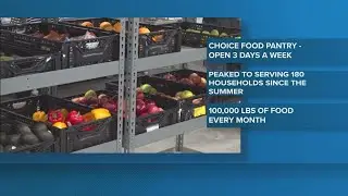 Helping stock the shelves of a Greensboro food pantry