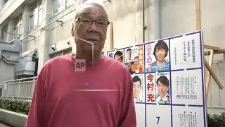Voters give thoughts as polls open in Japan with ruling party braced for a blow to its majority