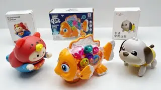 Electric Toy Unboxing and Review | Rocking Mechanical Fish | Tumbler Superman | Crawling Puppy