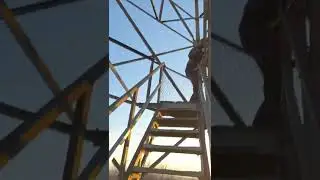 Climbing the fire tower at Gile Mountain, Norwich VT April 2022