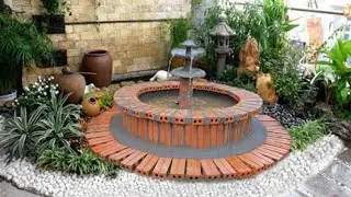 Building a circular aquarium from brick and cement unique waterfall design #Unlimitedideas